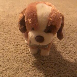 Cuddle Barn talking and barking dog. Has batteries.